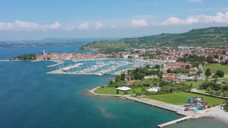 aerial: izola port harbour on adriatic coast, mediterranean sea in slovenia