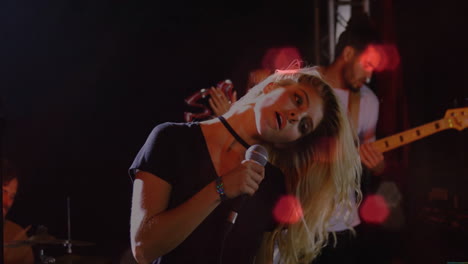 lead singer gripping microphone onstage, featuring animated sound waves and music chart overlays