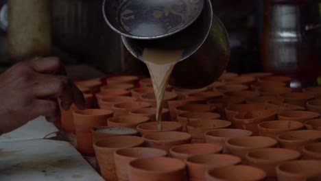 street chai latte in the streets of india in clay cups