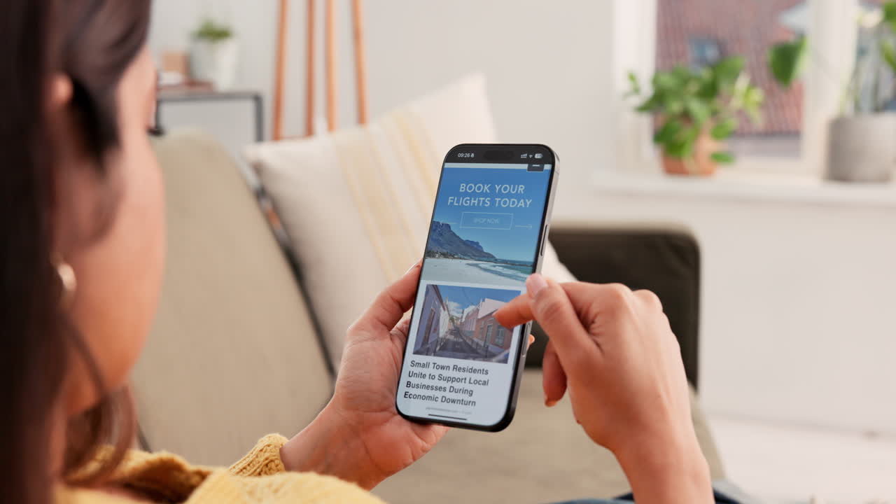 Woman using mobile phone with news and travel apps