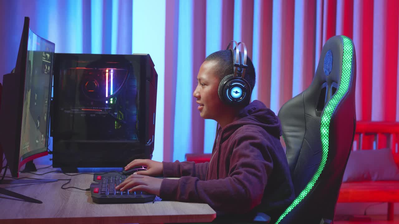 Boy Gaming on a Computer