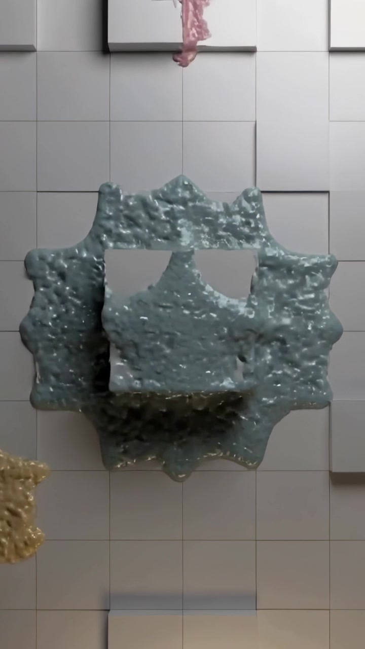 Vertical video: Dripping drops from top landing on grid wall in studio making teal pink gold pools