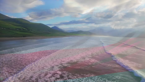 digital composition of russia flag waving against aerial view of waves in the sea