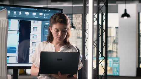 vertical video woman real estate developer works with 3d tools and digital blueprints