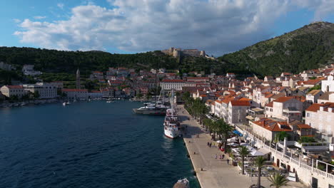waterfront town of hvar and promenade in hvar island, croatia. - aerial shot