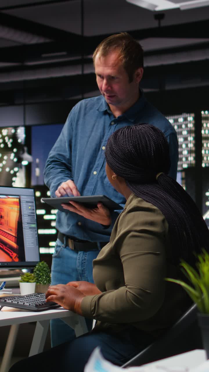 Vertical Video Team of skilled engineers creating Mars based virtual station using turbine