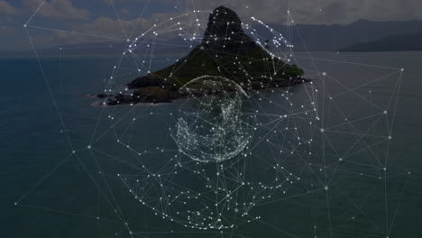 animation of globe with network of connections, over rocky island in sea