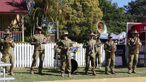 soldiers playing instruments at outdoor event