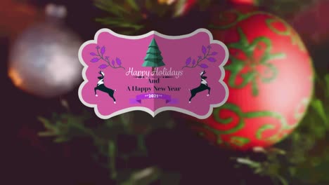 Animation-of-present-tag-with-christmas-greetings-on-christmas-decoration