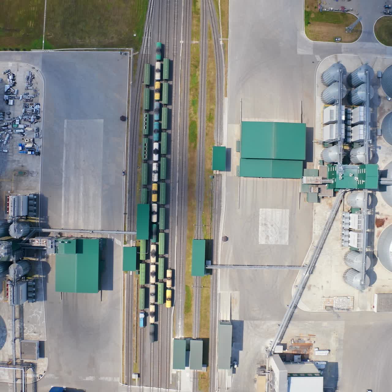 Modern agricultural architecture landscape. Big steel grain elevator warehouse