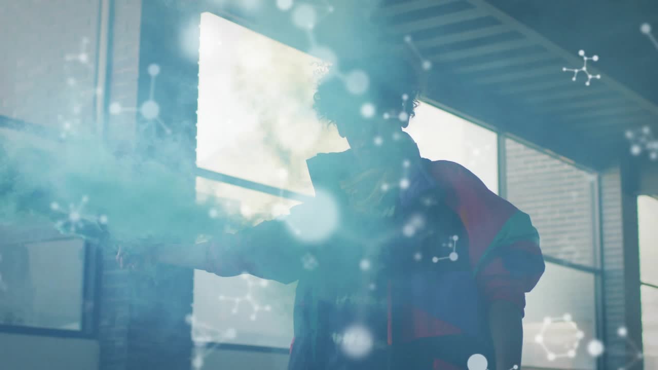 Male model holding flare, emitting teal smoke across loft panes, fashion molecule overlay appearing