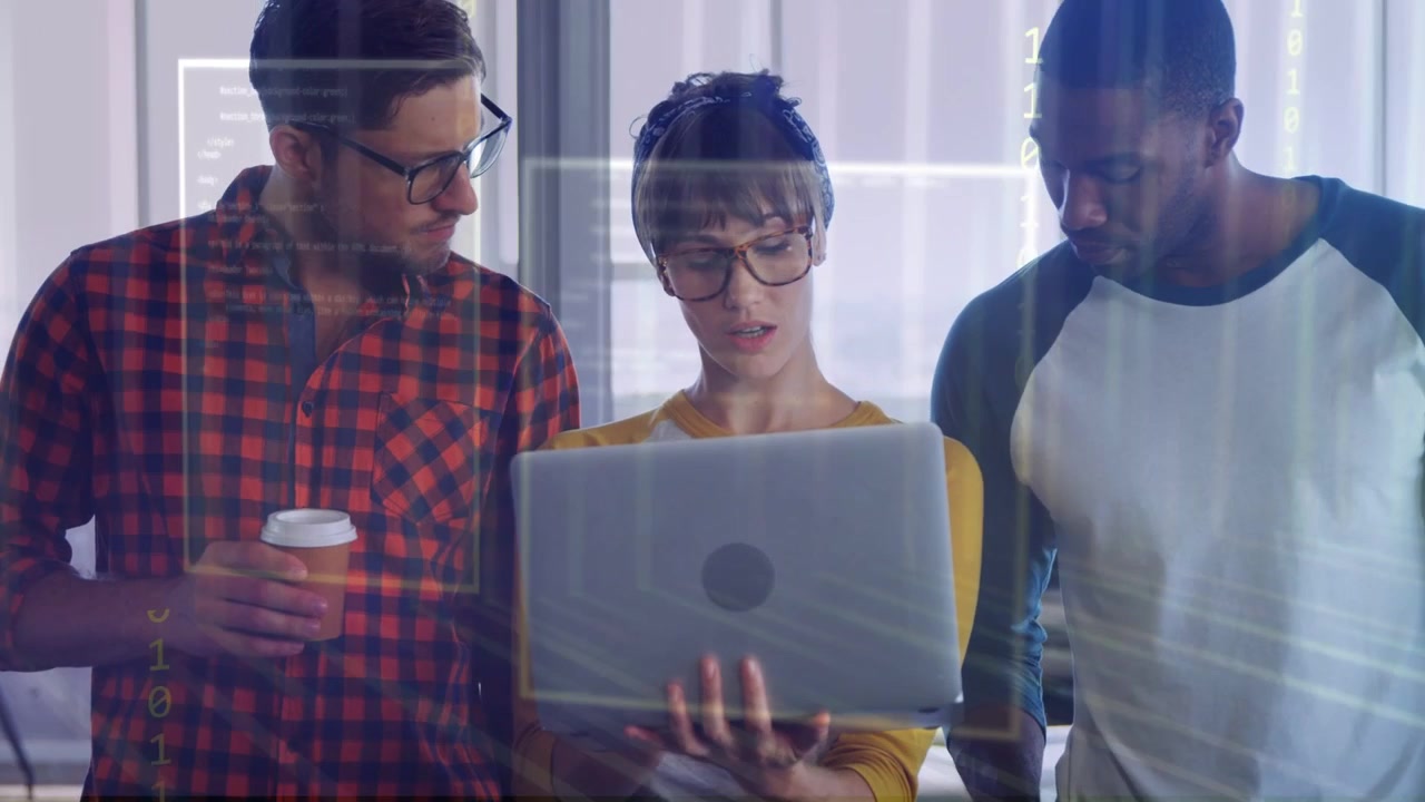 Lead woman pointing under laptop causing UI overlay appearing and explaining project for designers