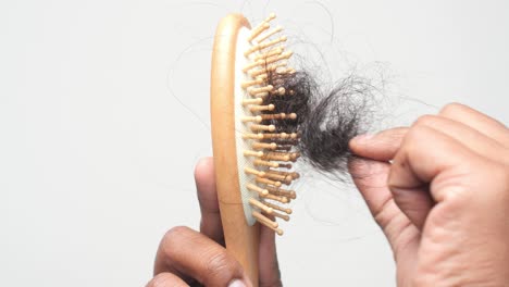 hair loss problem - hairbrush with hair strands