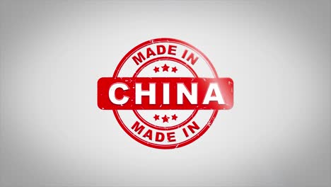 made in china signed stamping text wooden stamp animation. red ink on clean white paper surface background with green matte background included.