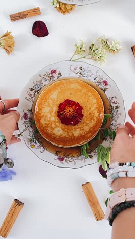 beautiful stacked pancakes with flowers