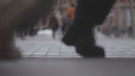 person walking on city street