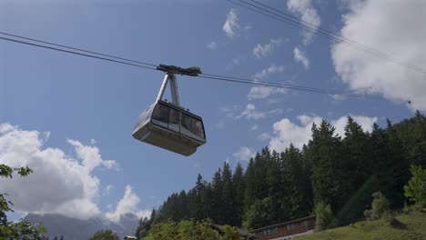 gondola ascending in murren, switzerland