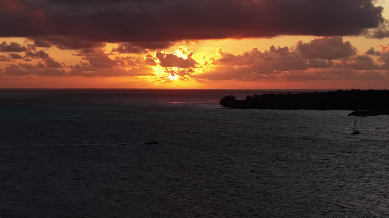 Sunset Over Bora Bora Island and Lagoon, Orange Skyline and South Pacific Ocean, French Polynesia