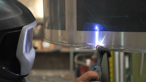 Welder,-using-VIG,-TIG,-MIG-MAG-method-to-welding-stainless-steel-parts,-close-up