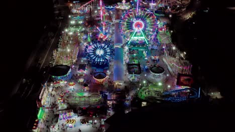 aerial night shot of the fairgrounds at the "feria de león" in león, guanajuato, méxico