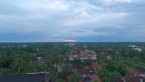 Sunrise-Timeless-over-Beautiful-Tropical-Town-with-Palm-trees