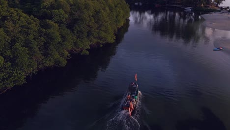 boat from sea into mangroves on creek