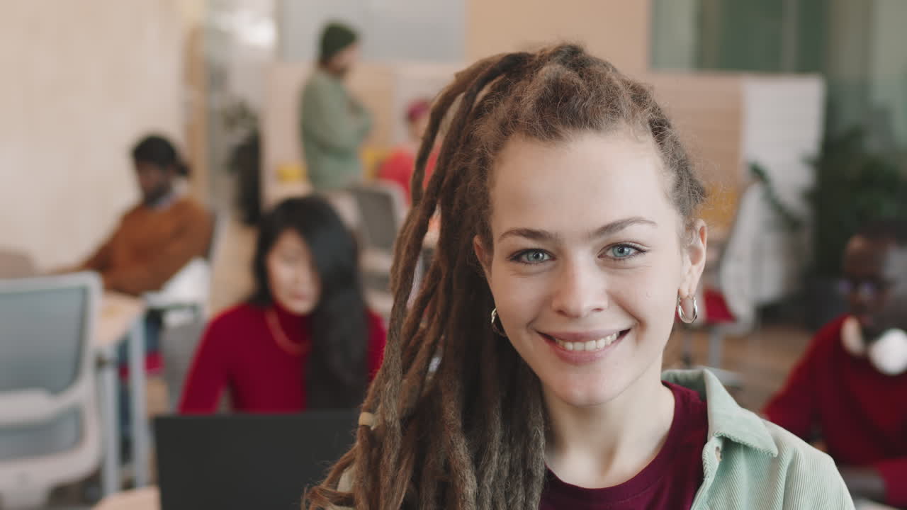 Portrait of Happy Businesswoman in Dreadlocks