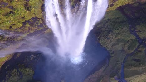 aerial drone shot of seljalandsfoss waterfall in south iceland. vertical view