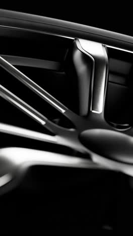 modern automotive alloy wheel closeup. vertical looped animation