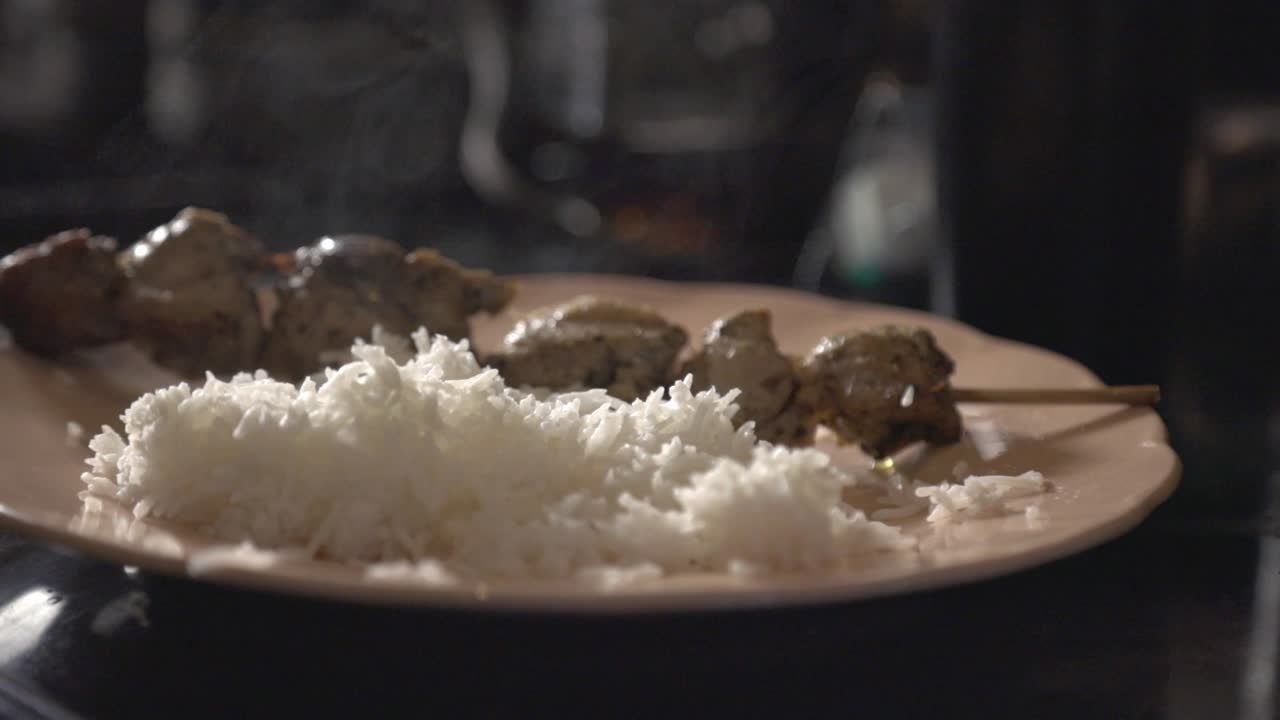 Freshly Cooked White Rice With Pork Shish Kabob On Plate.- closeup shot