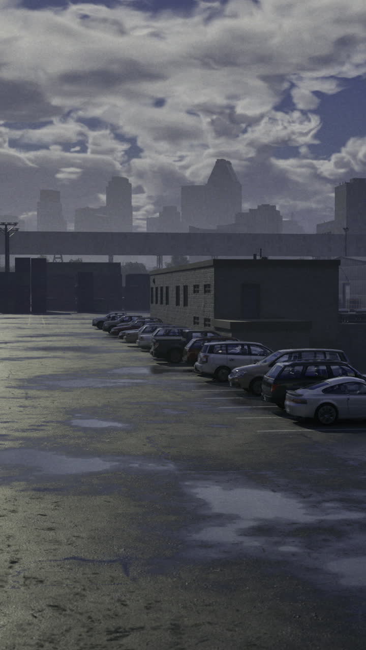 Industrial parking lot illuminated by clouds over urban skyline at dusk