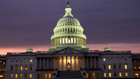 the us capitol building at dusk