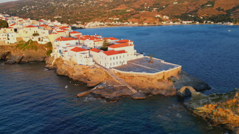 aerial drone view video of iconic and beautuful andros island chora, cyclades, greece at dusk