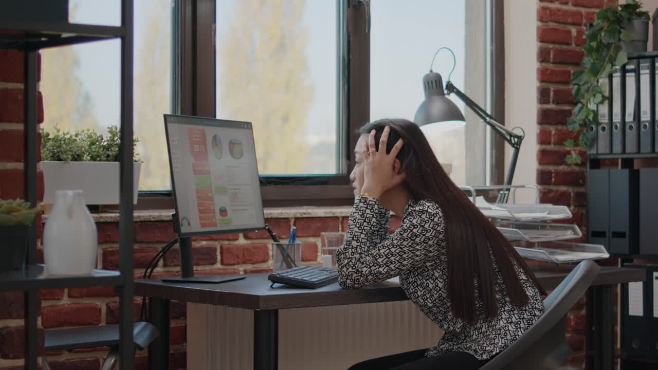 Frustrated employee working under pressure about deadline