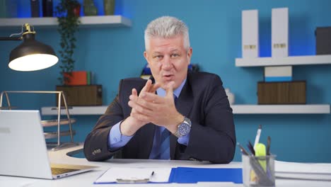 Businessman-clapping-while-looking-at-camera-with-pride-and-joy.