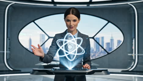 Businesswoman Interacting with Holographic Atom in Futuristic Office