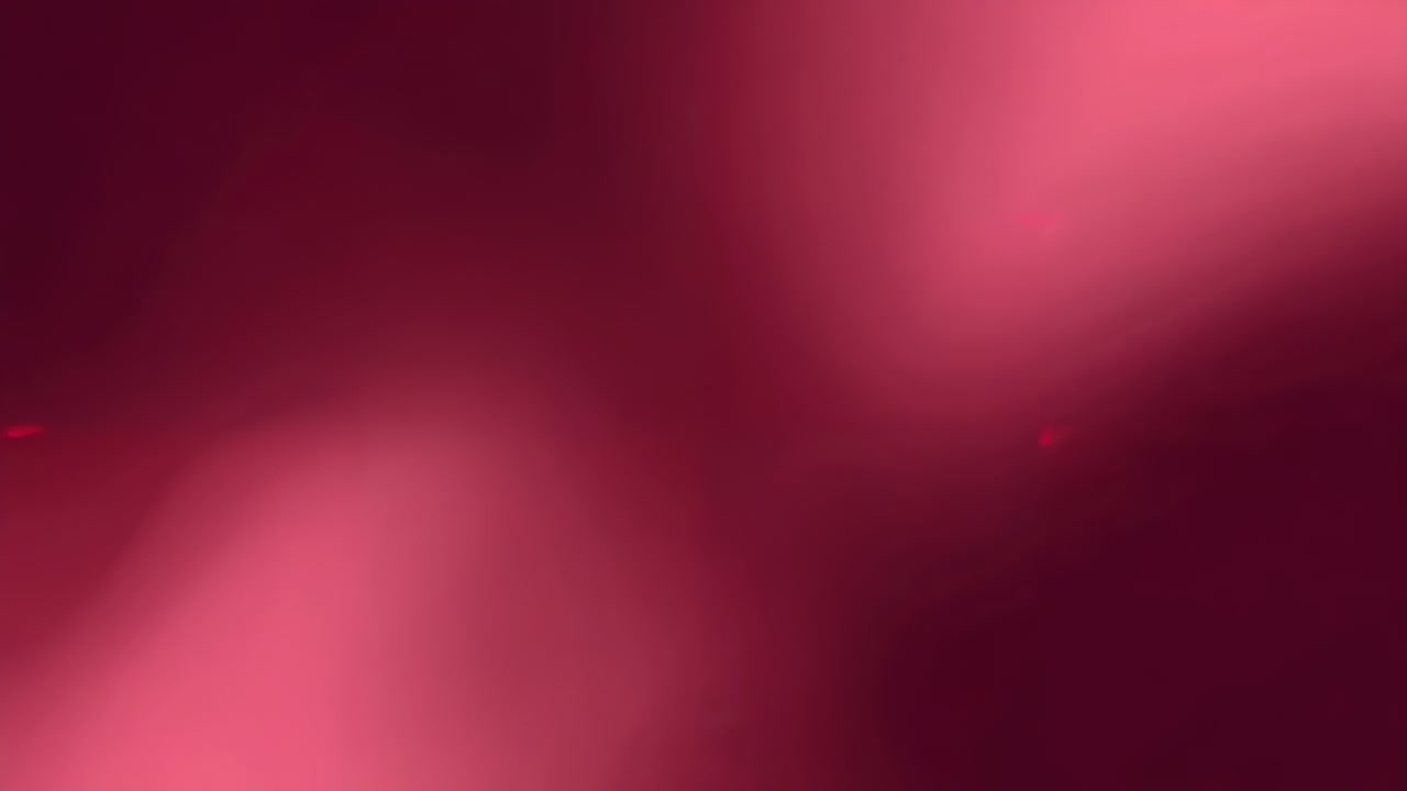 Recording camera filming macro pink-maroon gradients shifting at close range after near-lens moving