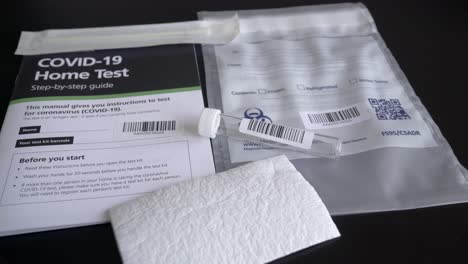 covid-19 coronavirus test kit with equipment needed to make a self test swab test