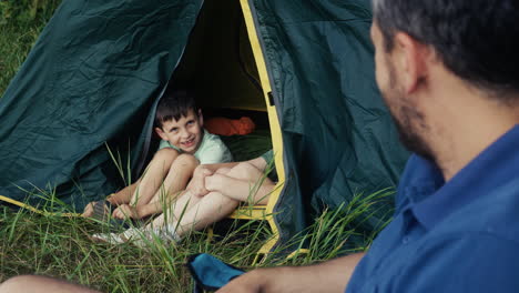 kids inside a camping tent