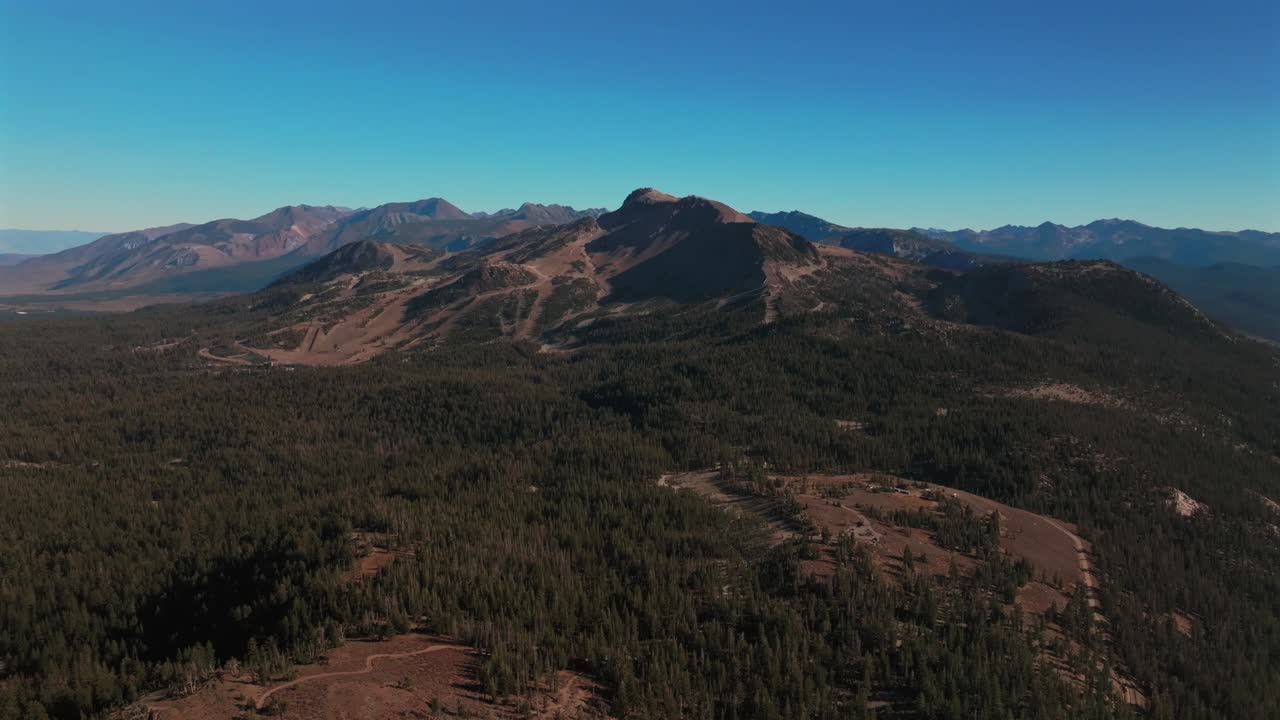 Minarets Upper Panorama trail view Mammoth Lakes Mountain Ski Area McCoy Station Main lodge Devils Postpile summer autumn fall aerial drone California sunny daytime blue sky forward motion