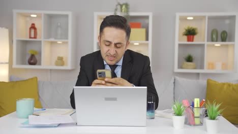 home office worker man having problems and stress on the phone.