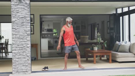 Video-of-african-american-senior-man-practicing-at-home