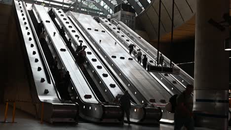 escalators with people