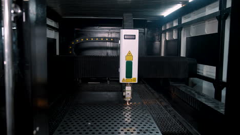vinnytsia, ukraine - january 19, 2023: machine for laser cutting of metal sheet parts. technology sheet metal manufacturing process by laser cutting machine