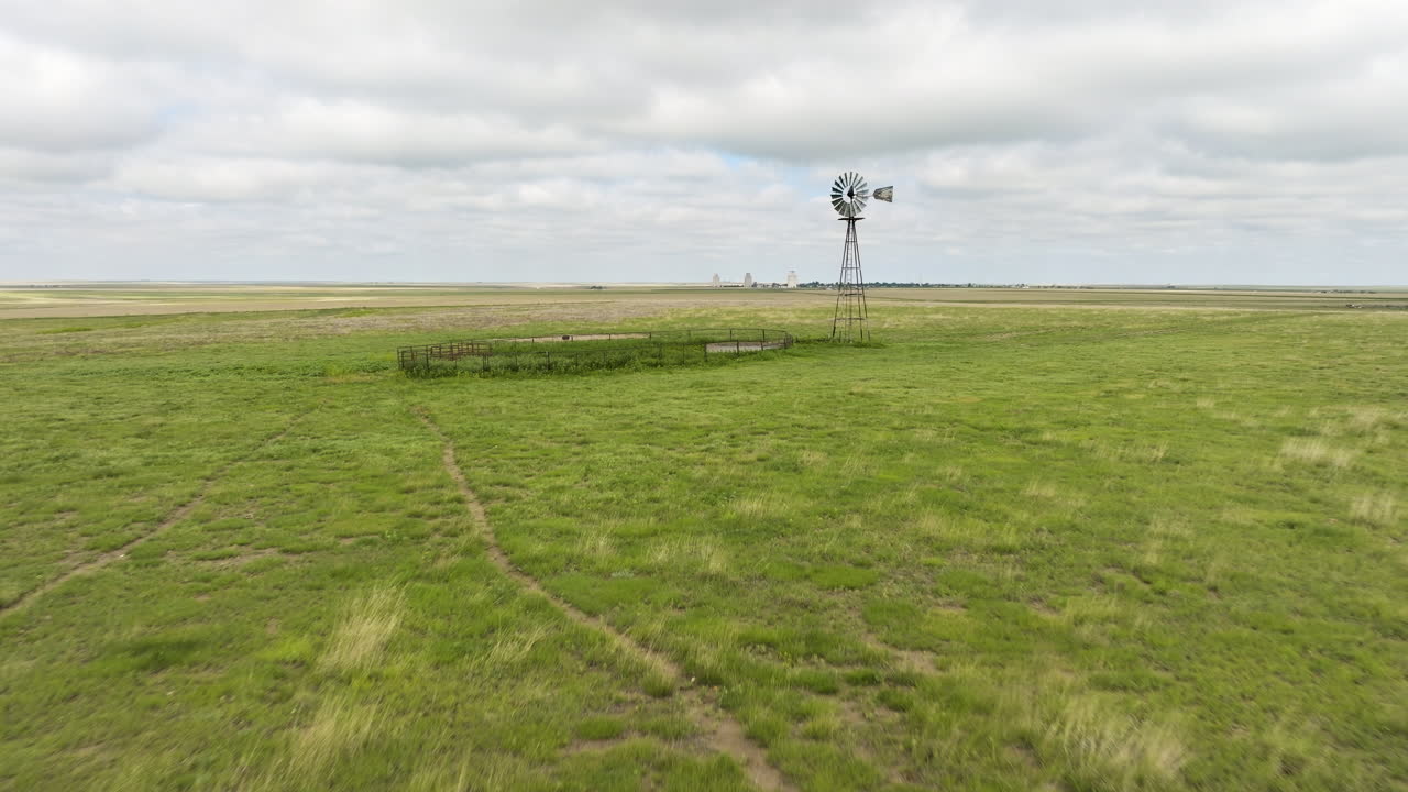 Rural Landscape with Windmill and Farm Structures