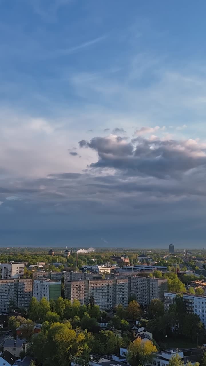 Time-lapse above Purvciems in Riga, Latvia, capturing the cityscape with clouds drifting by.