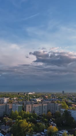 time-lapse above purvciems in riga, latvia, capturing the cityscape with clouds drifting by.