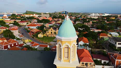 drone parallax orbit rises to reveal santa famia church otrobanda curacao