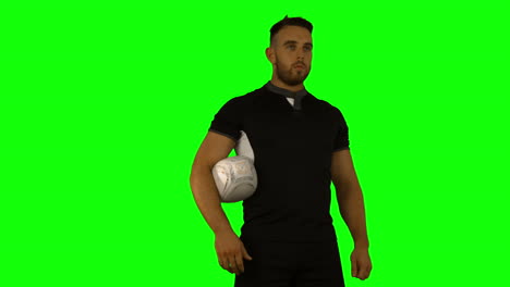 Serious-rugby-player-with-ball-