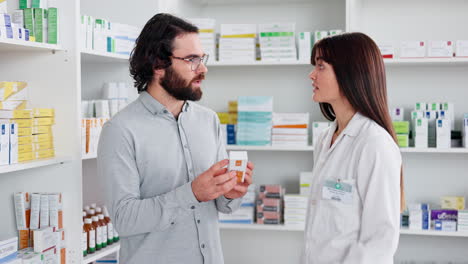 Sick-customer-being-assisted-by-a-pharmacist
